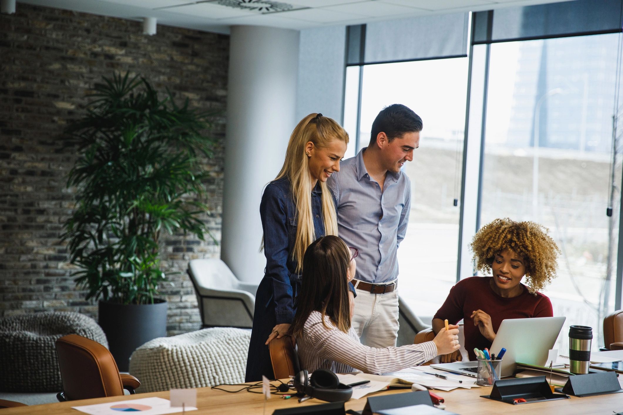 Team collaborating in an open plan office